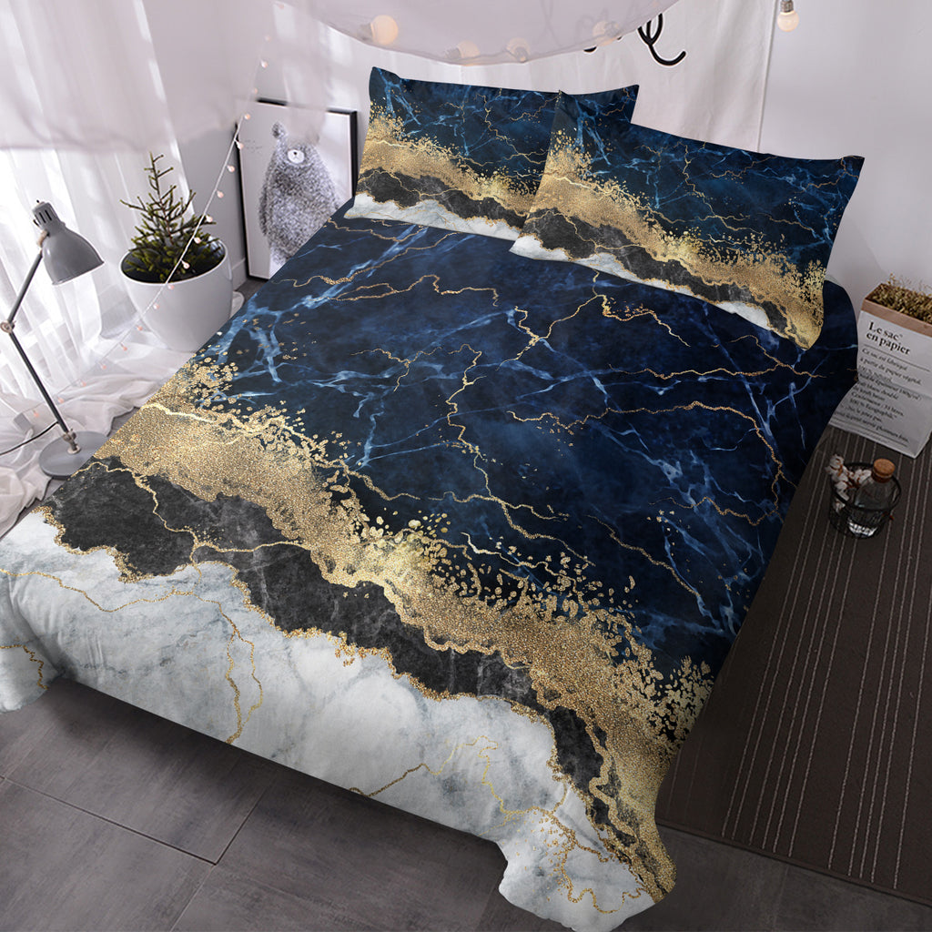 Chic white marble bed linen with gold accents.