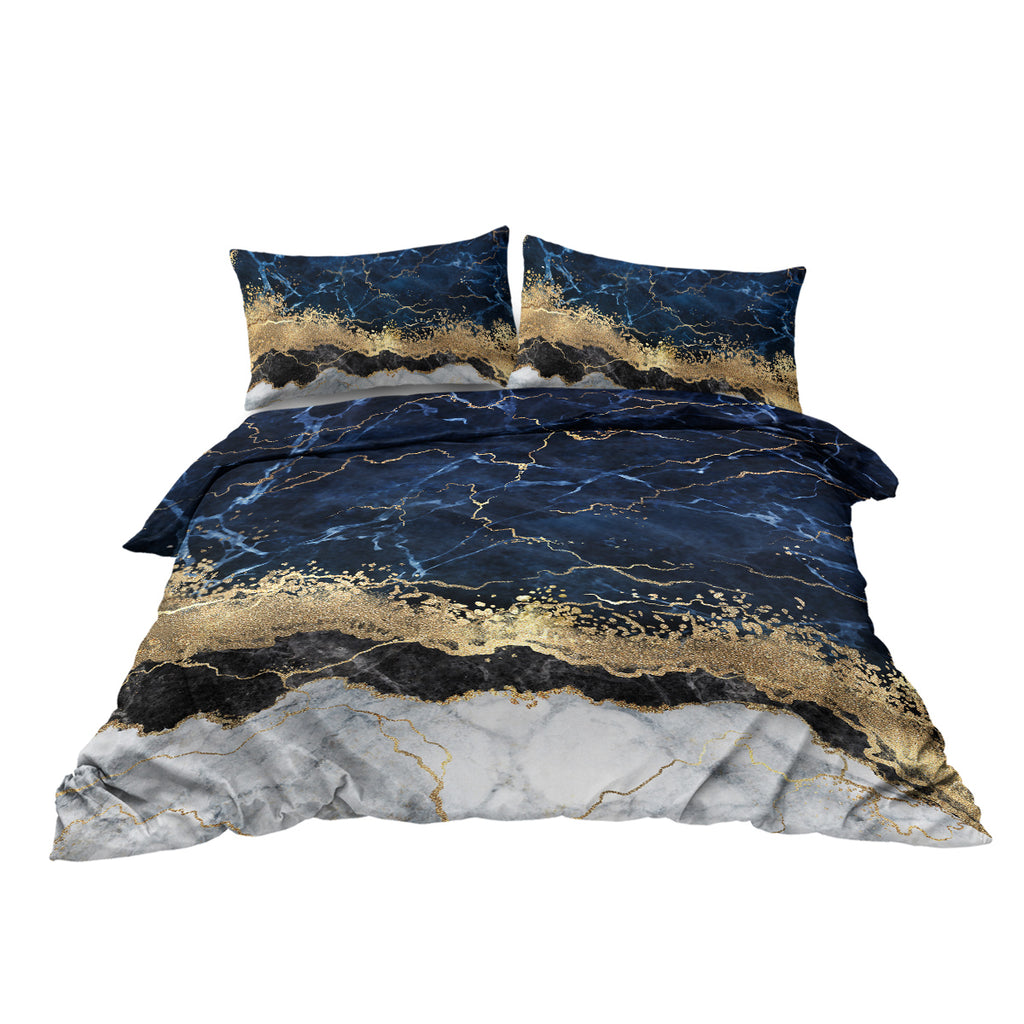 Chic white marble bed linen with gold accents.