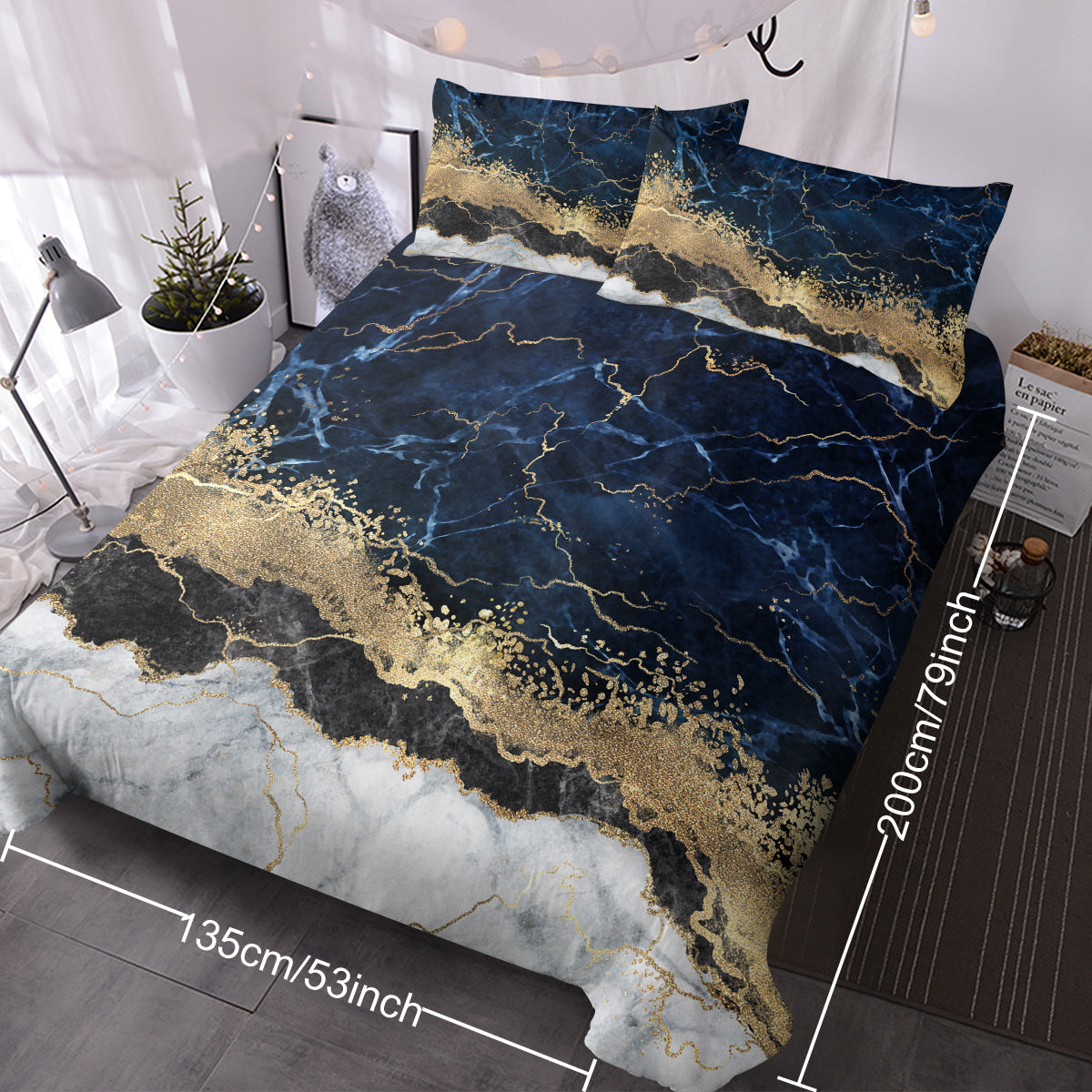 Chic white marble bed linen with gold accents.